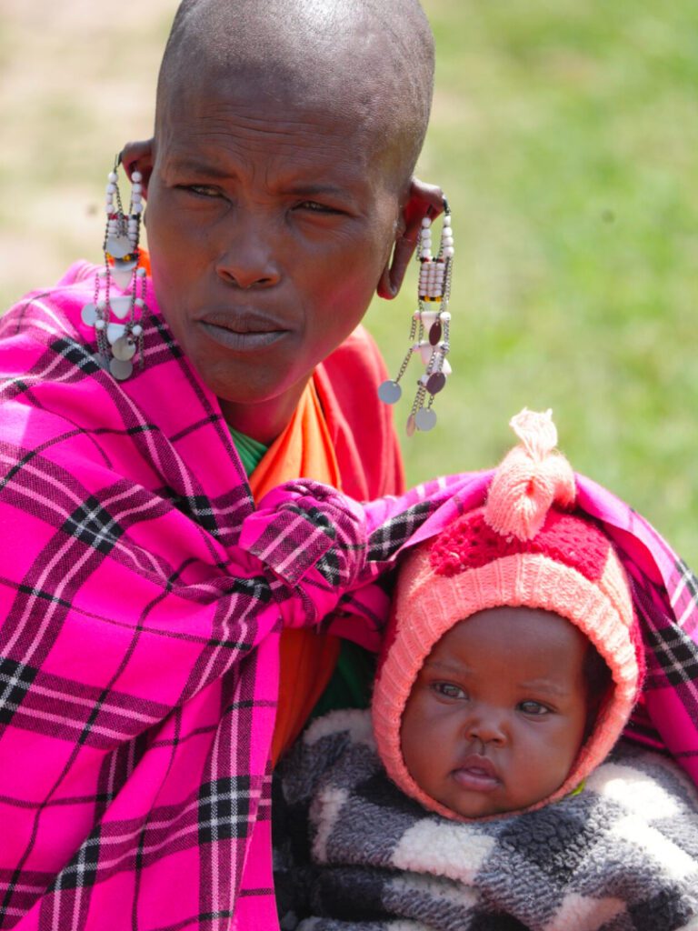 A woman and baby in pink clothes